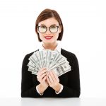 young-businesswoman-showing-money